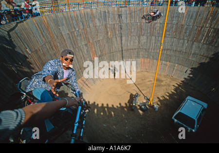 Motorbike on a wall of death, snatching money from the crowd, Maha Kumbh Mela 2001, Allahabad, Uttar Pradesh, India Stock Photo