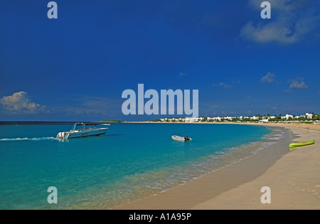 Anguilla beach water motor boat kayak deserted beach Cap Juluca resort Maundays Bay beach Stock Photo