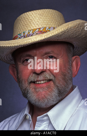 Smiling man wearing Panama Hat made of straw Stock Photo
