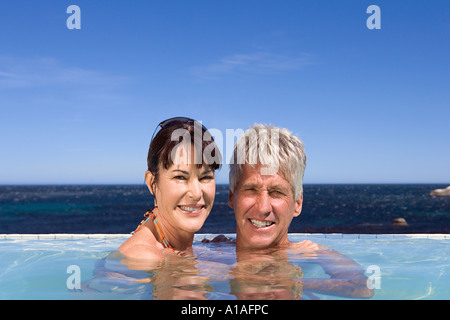 Mature couple in swimming pool Stock Photo