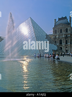 The Famous old Louvre Museum building with The glass Pyramid designed by Chineese American Architect Ieoh Ming Pei finished 1989 Stock Photo