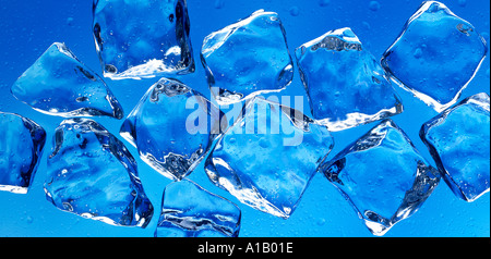 ICE CUBES ON BLUE Stock Photo