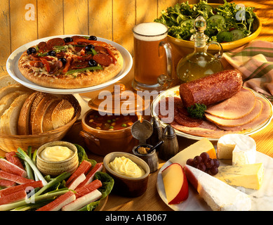 VARIOUS FOODS ON TABLETOP BUFFET Stock Photo