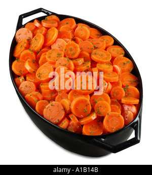 sliced carrots in black dish Stock Photo
