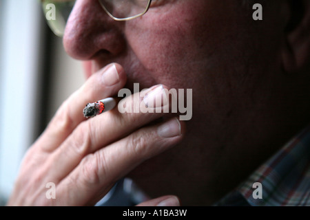 man smoking Stock Photo