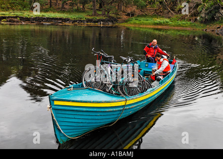 On the boattrips to the upper lake also bycicles are transported, Killarney National Park, Ireland Stock Photo