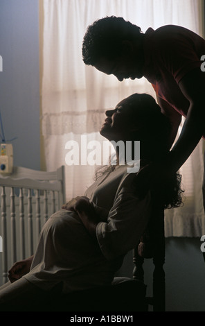 expectant couple in their nursery Stock Photo