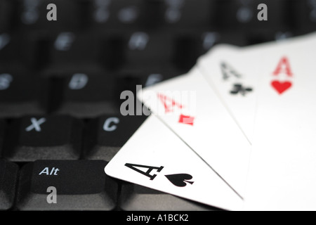 Concept online gambling aces cards and computer Stock Photo
