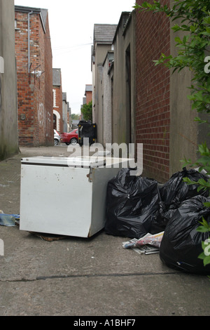 Litter and rubbish in the alleyways in the holy land belfast northern ireland Stock Photo