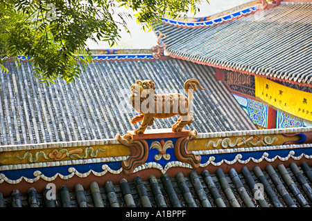 CHINA FENGDU Numerous temples have sculptures of demons and devils and fanciful curved roofs with carvings of lions Stock Photo