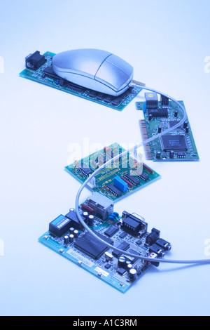 Computer Mouse on Circuit Boards Stock Photo