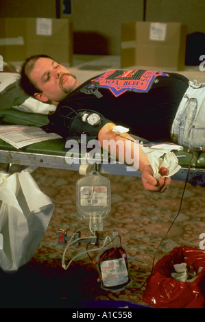 Man donates blood to the American Red Cross Arlington Virginia Stock Photo