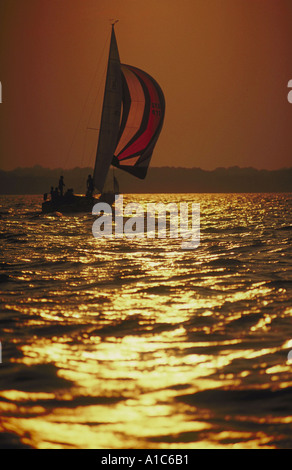 Sailboat with spinnaker as it sails on the Chesapeake Bay near Annapolis Maryland Stock Photo