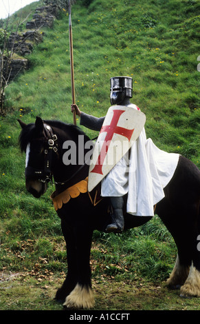 Historical Re-enactment, Crusader Knight, early Medieval period, horseback, red cross, shield, sword, weapons, weaponry, Stock Photo