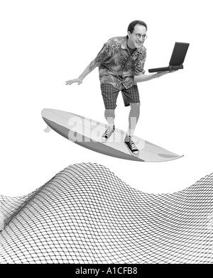 Comical man balancing laptop on surfboard Stock Photo