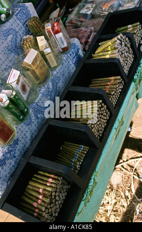 Myanmar Burma Mandalay Pyin Oo Lwin formerly Maymyo leisure travelling funfair cheroot and cigarette stall at local fair Stock Photo