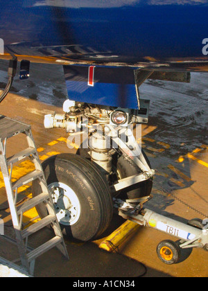 United Airlines Boeing 747-400 nose wheel and tug attachment OHare Airport Chicago USA Stock Photo