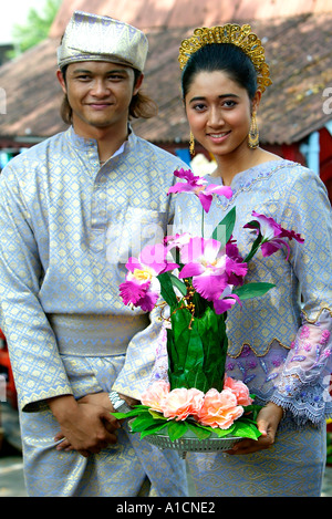 Young couple in traditional wedding costume Malacca Malaysia Stock Photo