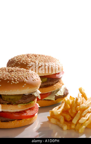 Two appetizing colorful hamburgers and french fries Stock Photo