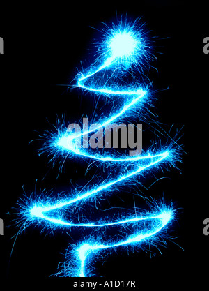 Sparkling christmas tree made with sparkler lights Isolated on black cutout symbol pattern Stock Photo