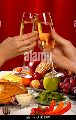 Clinking wineglasses Stock Photo