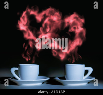 Valentines Day Two cups of coffee with a romantic heart-shaped steam Stock Photo