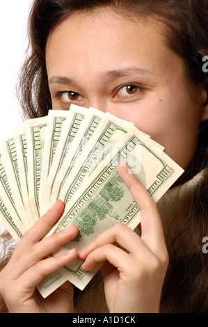 Happy Woman Covering With Hundred Dollar Bills Stock Photo