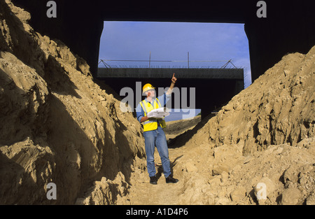 surveyor consulting plans coordinating road bridge construction uk Stock Photo