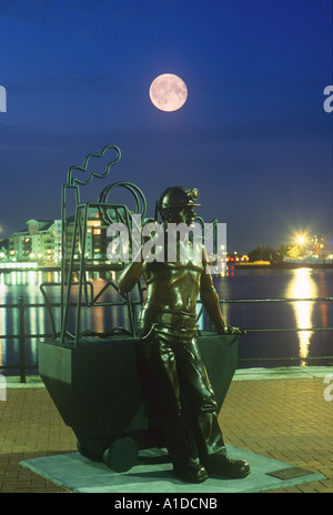 Sculpture of Welsh Miner in Moonlight Cardiff Bay South Wales Stock Photo