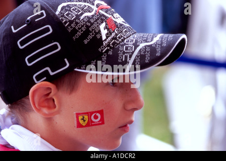 A young boy spectator at the Melbourne Grand Prix Stock Photo