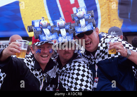 Three typically Australian spectators at the Melbourne Grand Prix Stock Photo