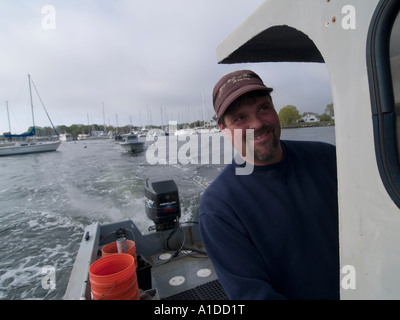 David Middleton Rhode Island Quahogger (shellfisherman) at work Stock Photo