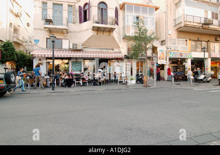 Israel Tel Aviv Drinking Coffee and relaxing in an open air cafe in Shenkin Street November 2005 Stock Photo