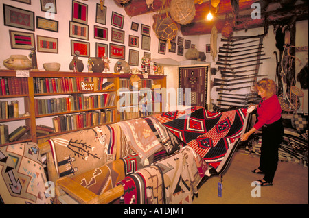 Elk225 5323 Arizona Hubbell Trading Post NM Navajo Reservation trading post rug room with visitor Stock Photo
