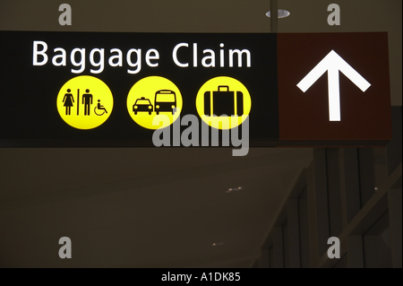 Baggage claim ground transportation sign in airport Stock Photo ...