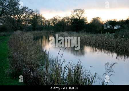 winter sunset over Grand Wsetern Canal at Holbrook Devon Stock Photo