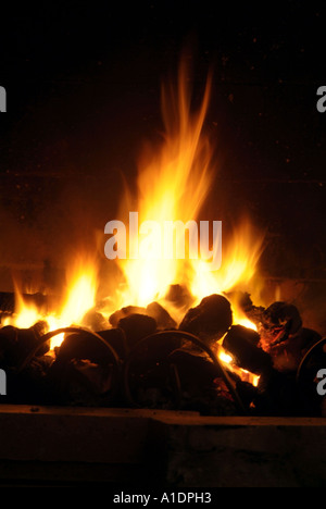 open, fire, flame, flames, burn, burning, coal, wood, log, logs, carbon, dioxide, footprint, fossil, fuel, heat, light, smoke, c Stock Photo