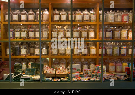 Old fashioned sweet shop with candy in glass jars in Burford Oxfordshire United Kingdom Stock Photo