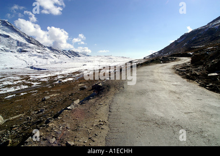 Twisted empty road in Rohtang pass at the side of Lahaul Valley, Indian Himalaya mountains Stock Photo