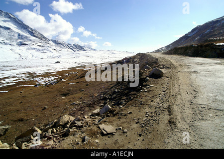 Side of twisted empty road in Rohtang pass at the side of Lahaul Valley, Indian Himalaya mountains Stock Photo