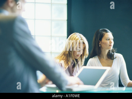 Two women and man in office Stock Photo