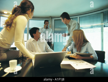 Businesspeople working in conference room Stock Photo