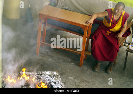 Tibetan buddhist monk preforming fire puja ritual in Namgyal monastery ...