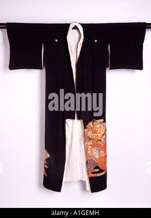 Stock photograph the front view of an antique black Japanese kimono Stock Photo