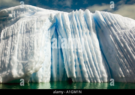 Massive iceberg with vertical grooves Antarctica Stock Photo