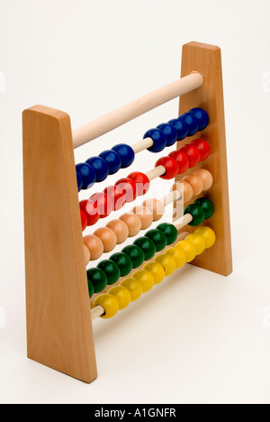 Colourful wooden child's Abacus educational toy on white background. Stock Photo