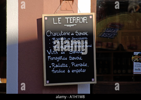 regional produce sign board outside shop in french village Stock Photo