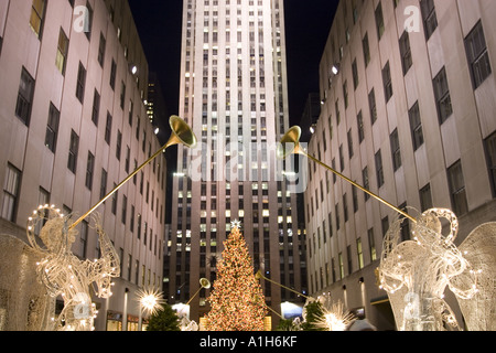 Christmas tree and angels blowing horns at Rockefeller Center New York City NYC Stock Photo