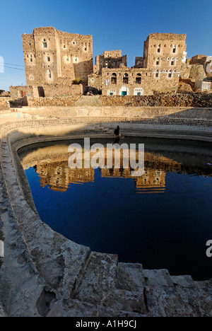 historic cisterne in the mountain village Shaharah Yemen Stock Photo