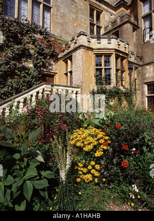 Stone steps beside a door way at Sudeley Castle with its fine gardens in the cotswolds  once the home of Katherine Parr Stock Photo